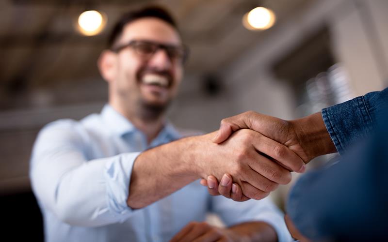 people shaking hands
